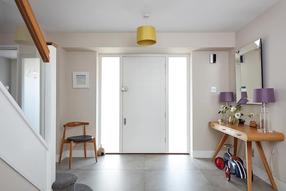 Contemporary front door and hallway. 